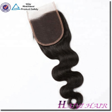 Las piezas de la armadura del cabello humano de China 100 de la alta calidad liberan el cierre del cordón de las piezas con el pelo del bebé